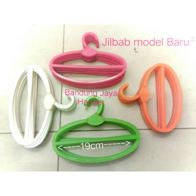 Hanger Oval Jilbab ada warna putih, pink, hijau dan orange, harga per Bh