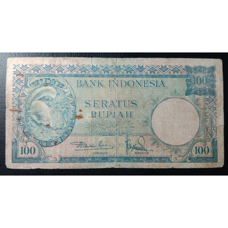 UANGKUNO 100 RUPIAH TUPAI THN 1957