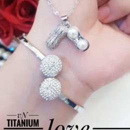 TiTanium set gelang kalung E06