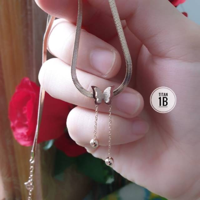 Kalung titanium kupu- kupu juntai pentol rose gold N27052000