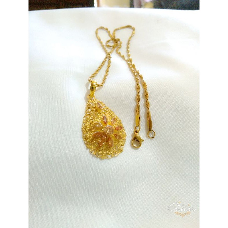 Kalung titanium mainan alpaka lapis mas