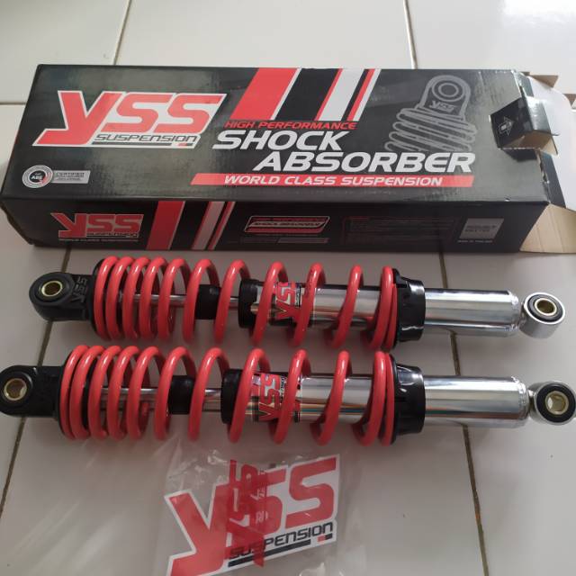 skok belakang supra125 merk yss warna merah