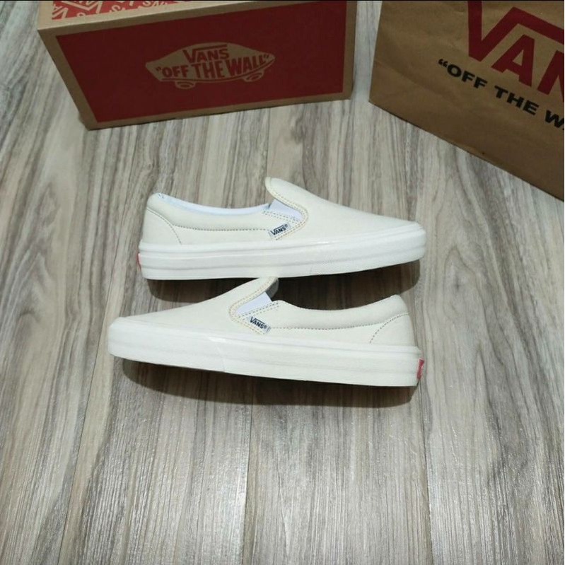 vans slip on cream white