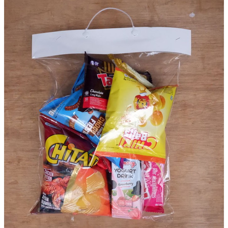 

Isi 20 Tas plastik kemasan polos ulang tahun snack ultah bingkisan souvenir pesta