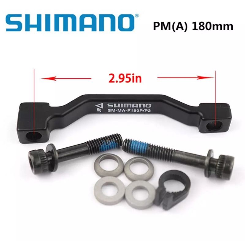 ORIGINAL SHIMANO ADAPTOR ROTOR CALIPER 7 INCH 180 MM POST MOUNT . ADAPTER KALIPER PIRINGAN SEPEDA REM DISCBRAKE 7INCH 180MM PM POST MOUNT BISA FRONT REAR DEPAN BELAKANG SEPEDA MTB FOLDING BIKE MOUNTAIN GUNUNG