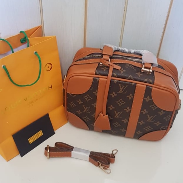 LV luggage / Sandra dewi