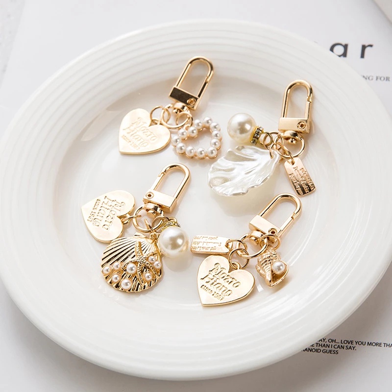 Gantungan Kunci Hadiah Ulang Tahun Shell Mutiara Hari Valentine Pesona Untuk Handbag Bentuk Hati Yang Sempurna Dompet Liontin Dengan Logam Faux Pearl Shell Emas Fashion Kristal Berlian Imitasi Berlian Buatan