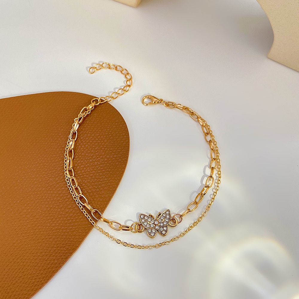 Gelang Tangan Rantai Metal Tipis Ringan Desain Kupu-Kupu Hias Berlian Metalik Untuk Wanita