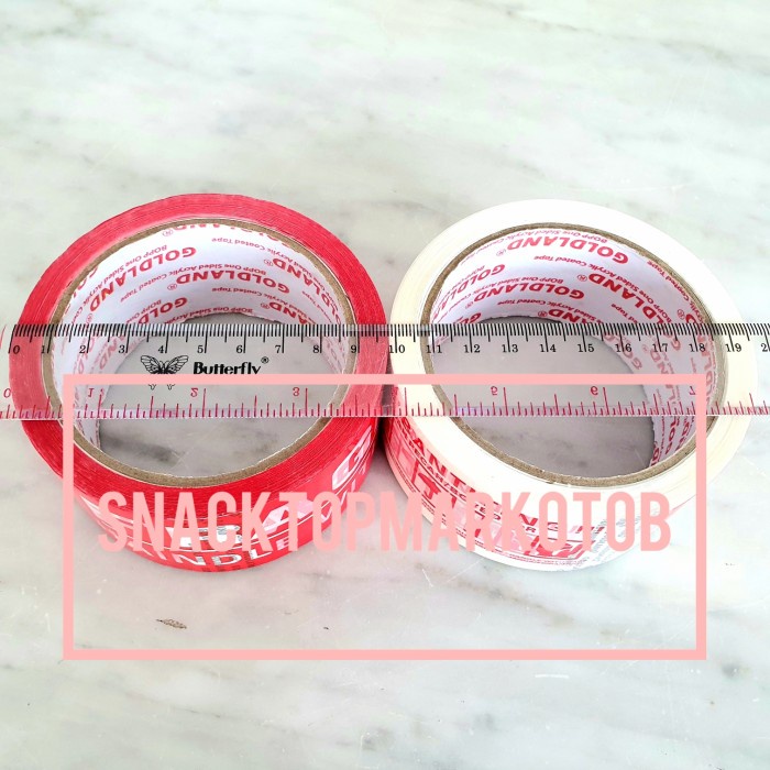 

perekat-pengikat- lakban fragile jangan dibanting merah/putih 2inch 50meter 2 bahasa - campur