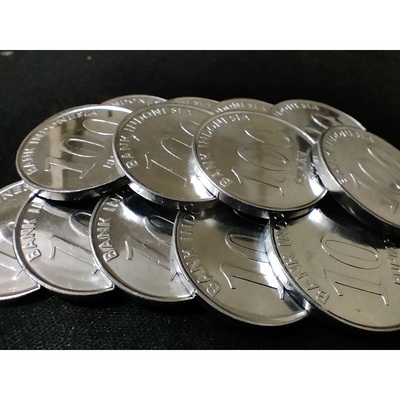 25 uang koin silver 100 rupiah