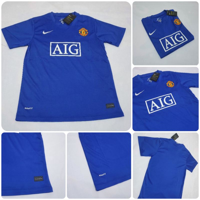 JERSEY BOLA RETRO MU AWAY BIRU AIG 2007 2008 GRADE ORI IMPORT
