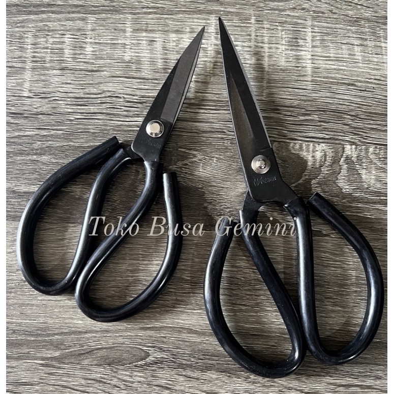 

Gunting kain merek W-Pecker