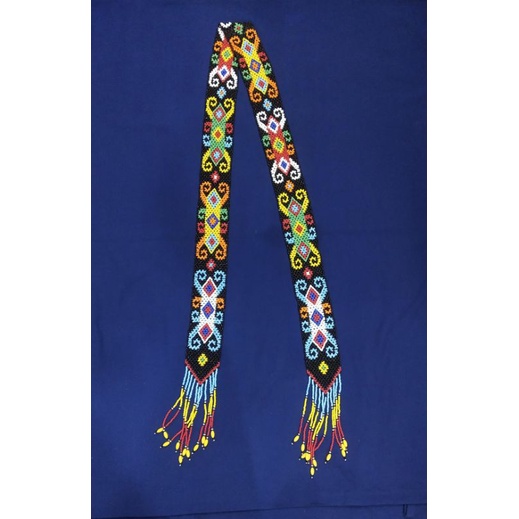 syal manik dayak kalimantan