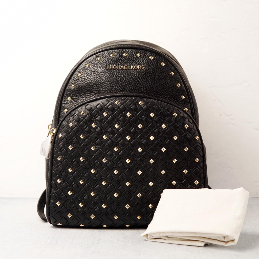 mk abbey studded backpack