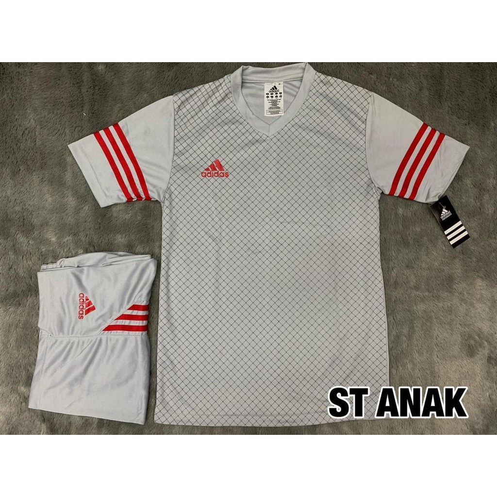 Baju Setelan Futsal Kaos Olahraga Bola Seragam Tim Futsal Anak SD SMP Strada Abu Putih Grosir Ori