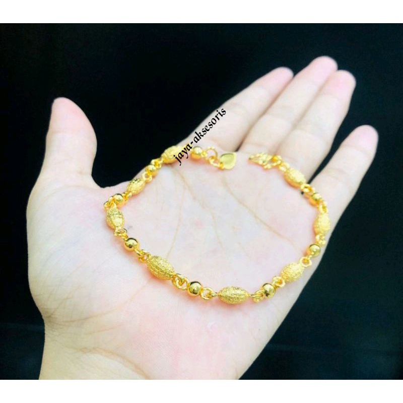 gelang tangan wanita titanium motip biji kacang lapis emas 24k