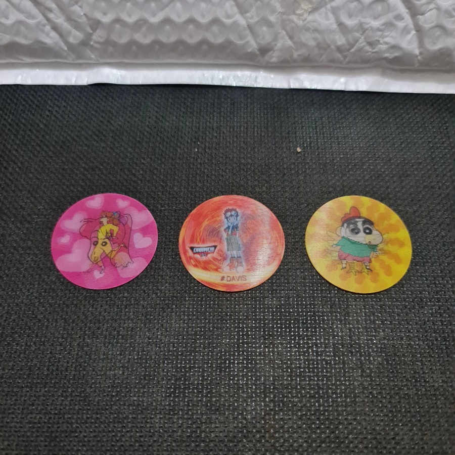 

Koin Hologram Crayon Sinchan dan Digimon Veemon 1 Set Hologram Anak