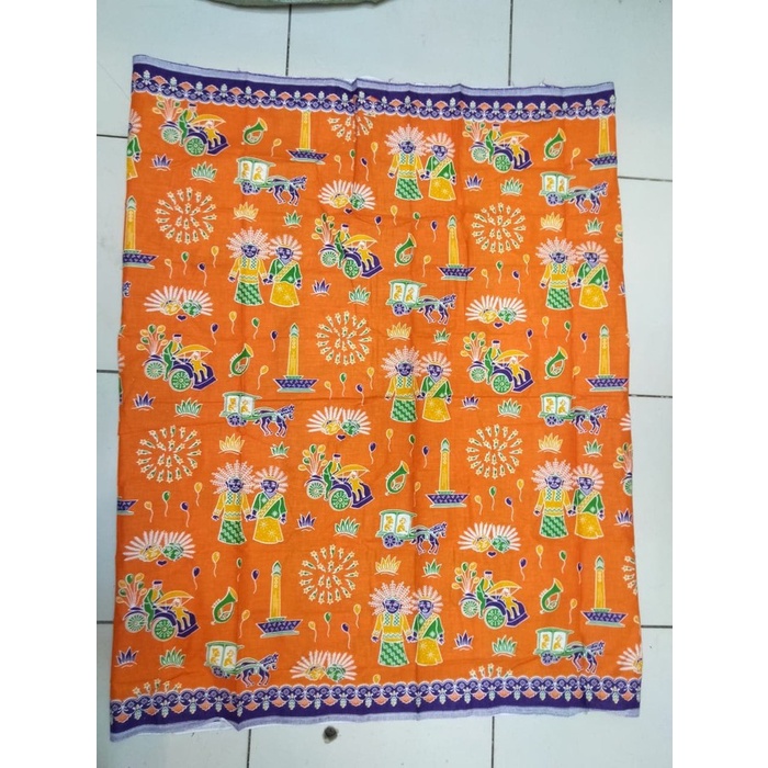 kain batik ondel ondel warna oren ungu