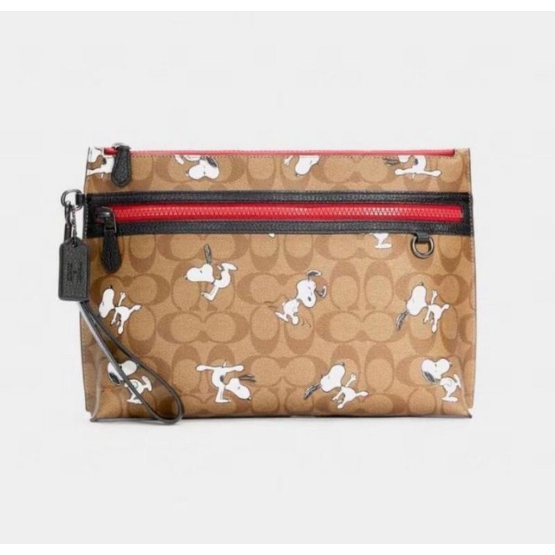 Coach X Peanuts Carryall Pouch In Signature Canvas With Snoopy Print (5734)
