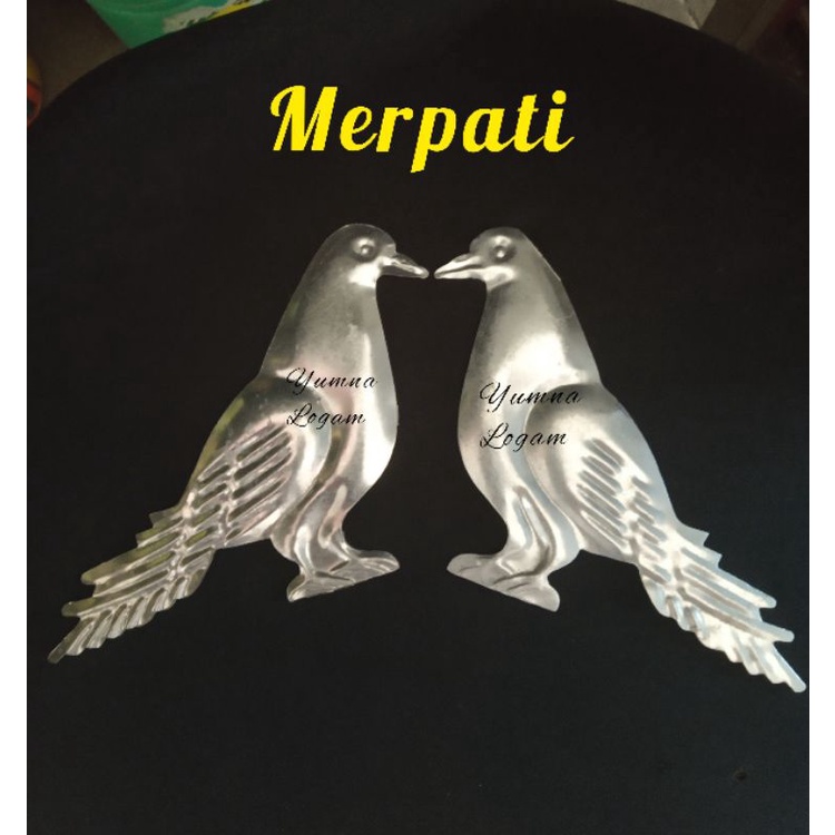 ORNAMEN PAGAR SEPASANG BURUNG MERPATI