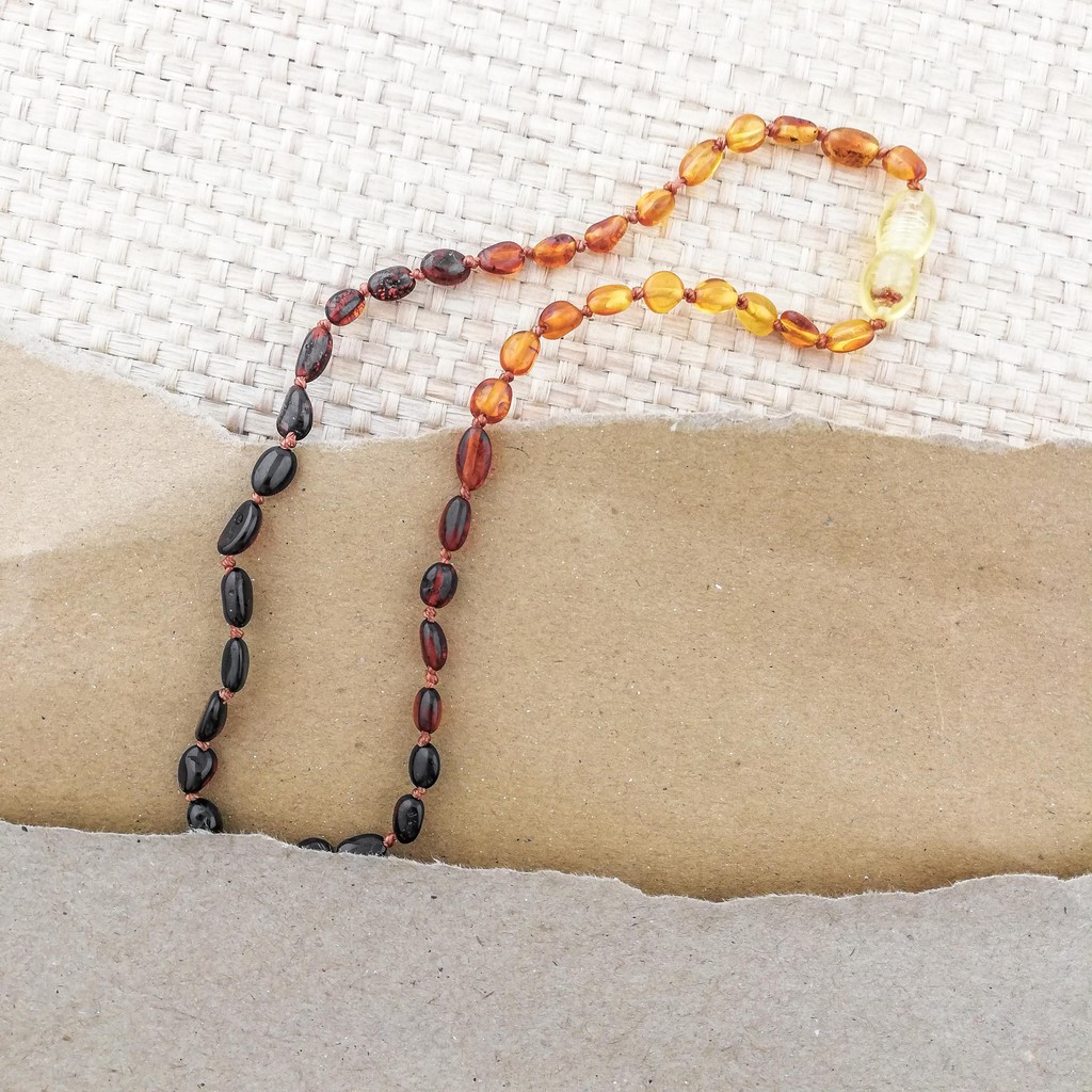 AS7 KALUNG AMBER TUMBUH GIGI ANAK