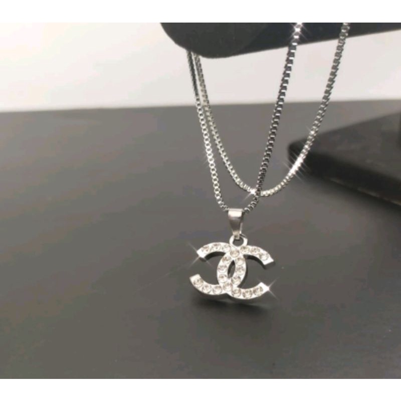 KALUNG TITANIUM MILANO LIONTIN CHENEL WANITA