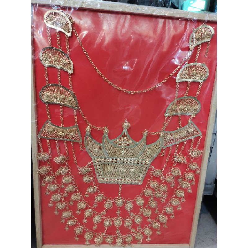 kalung penganten model rumah gadang.