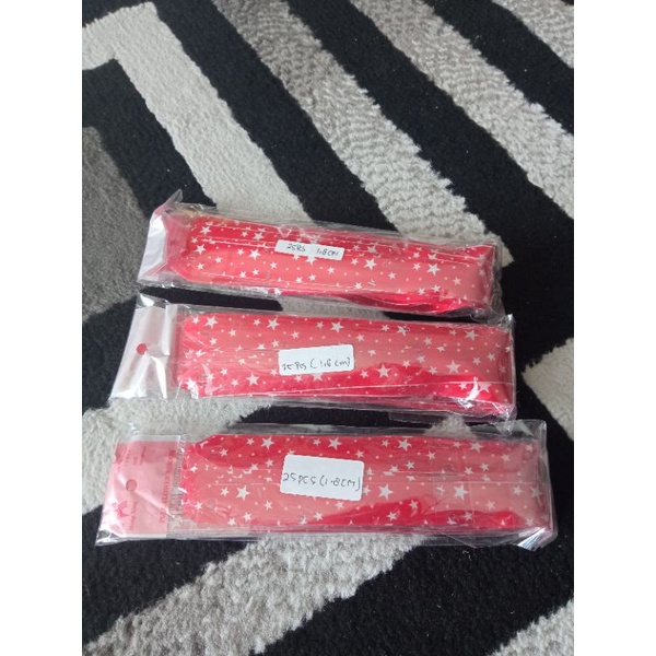 

pita serut merah (motif bintang) 25pcs