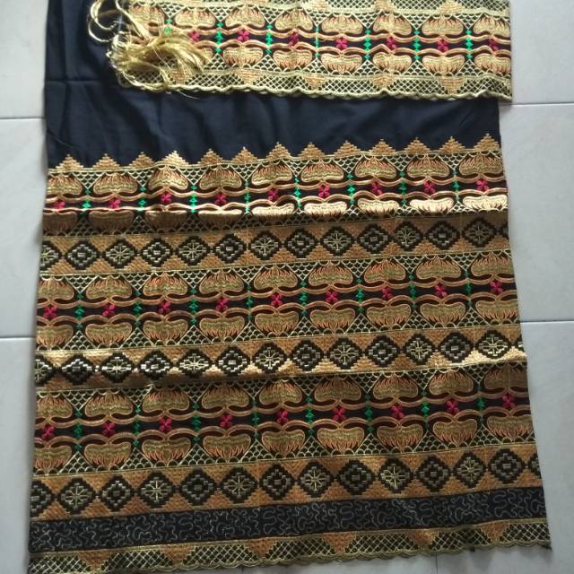 Kain Tapis bordir siger