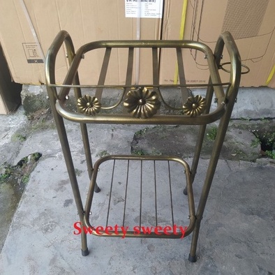 Rak Dispenser Besi Bunga