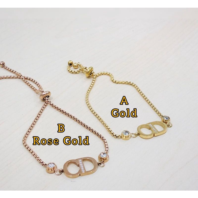 TSAMJ30 Gelang tangan serut titanium dewasa mod Dior CD