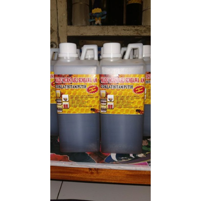 

Madu Sumbawa Asli Murni Original hitam putih 1kg