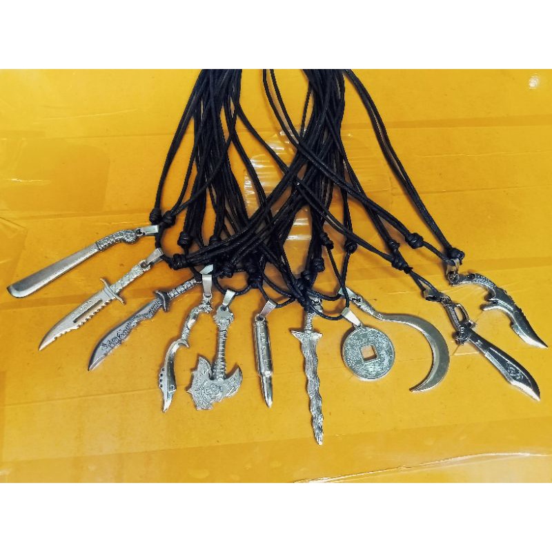 Kalung tali serut liontin 3D cocok pria&wanita.liontin kujang,golok,keris,pedang,pisau,badik,peluru,
