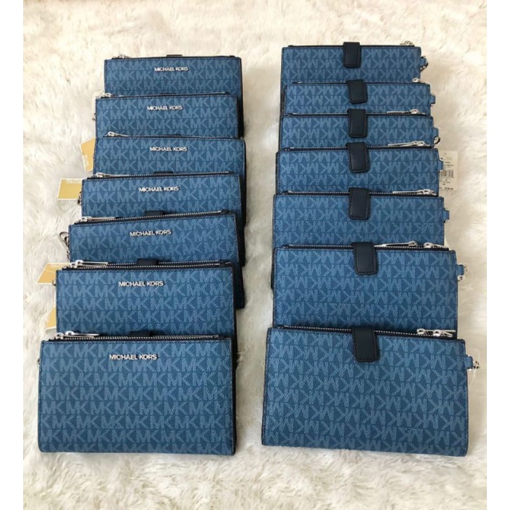dompet mk jet set travel large double zip wrislet chambray multi