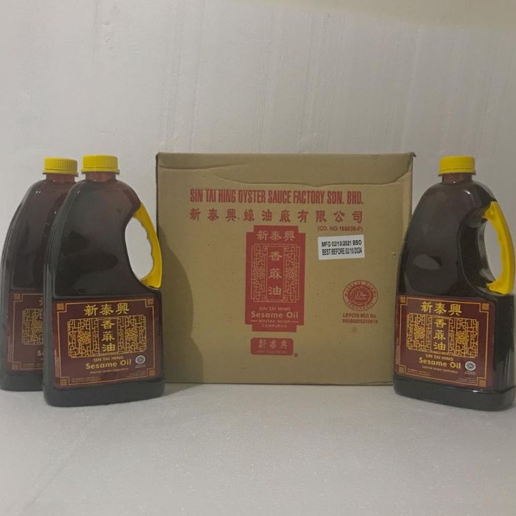 

Minyak Wijen sesame oil Sin Tai Hing 2000 ml ( 2 liter ) Halal