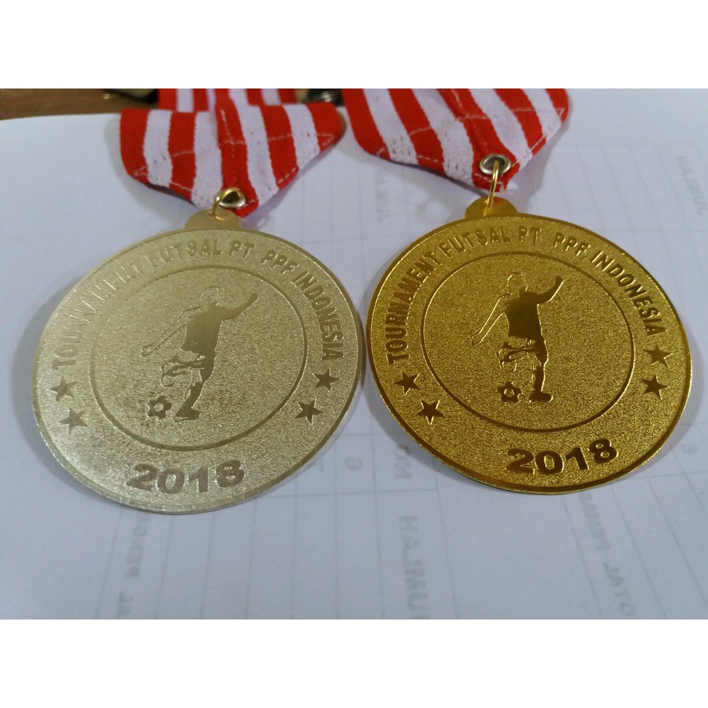 MEDALI KEJUARAAN SEPAK BOLA