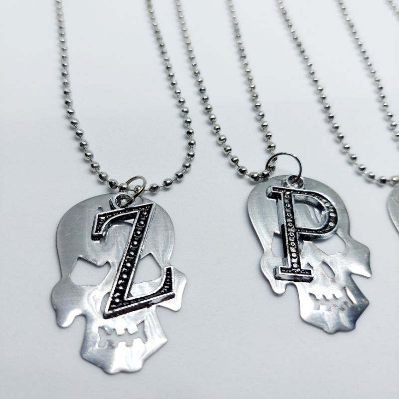 kalung metal huruf anti karat