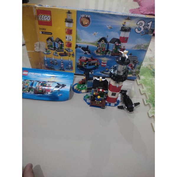 lego creator 31051 lighthouse point 3 in 1 cozy wildlife cottage