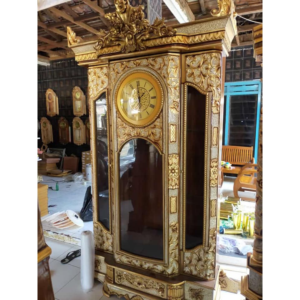 Lemari Jam Kayu Jati Ukir Ruang Tamu