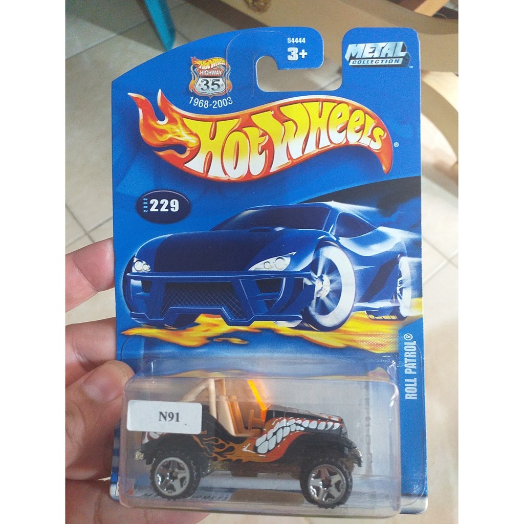 HOT WHEELS ROLL PATROL HITAM