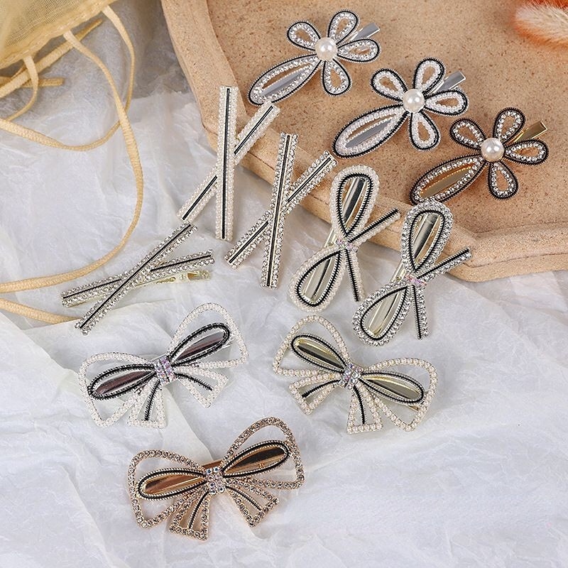Jepit Rambut Bentuk Pita Aksen Mutiara Gaya Korea Untuk Perempuan