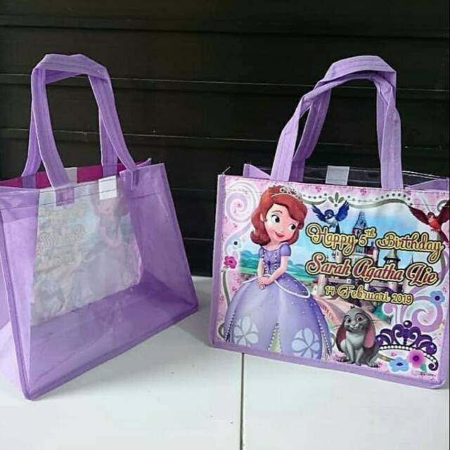 

Tas souvenir banner belakang mika