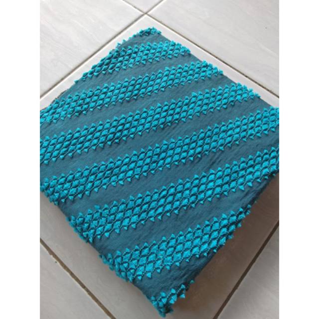 Kain tenun sutra bulu