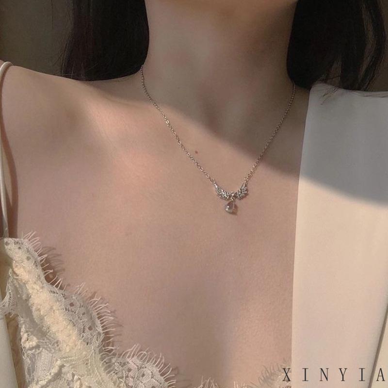 Kalung Rantai Desain Sayap Malaikat Bahan Alloy Untuk Wanita