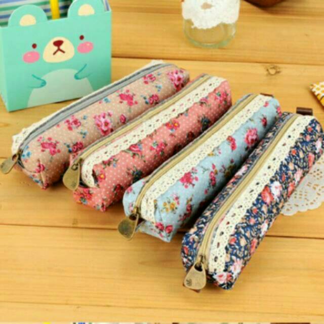 

Tempat pensil bulat motif bunga