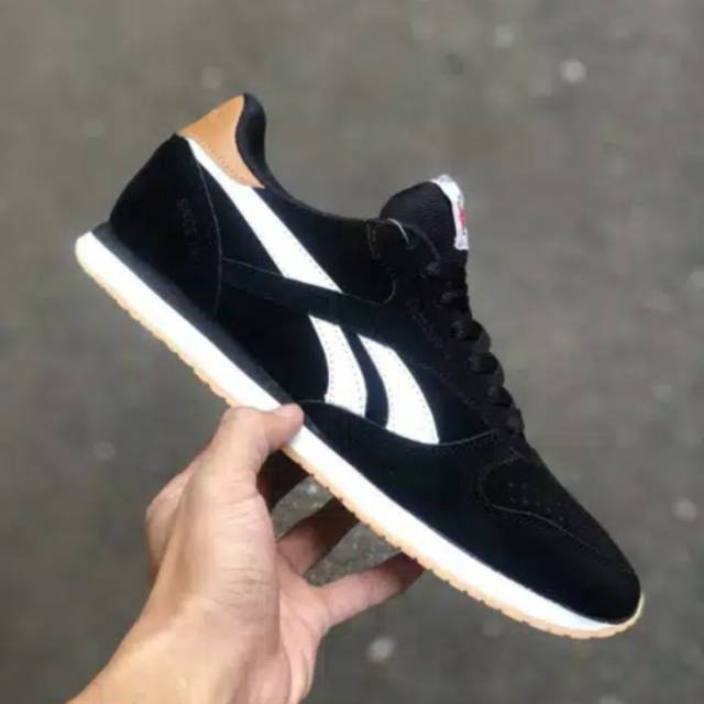 reebok black white gum