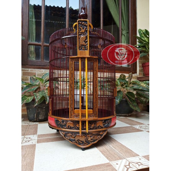 Sangkar anis merah/wambi ukir motif kilin