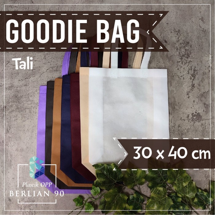 

TERBARU Goodie Bag Tali 30 x 40 Cm Tas Spunbond Handle Tas kain Polos - pink tua