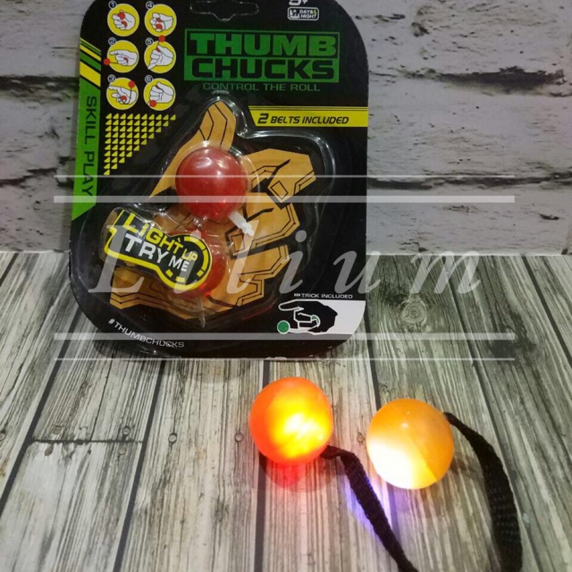 Fidget Thumb Chucks Lampu Mainan