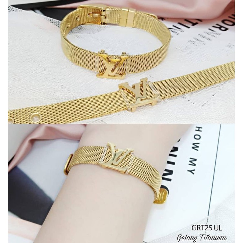 Gelang titanium motip jam tangan